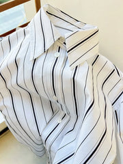 Black and White Striped Loose with A Wide Shoulder and Sleeve Top