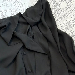 Asymmetrical loose long sleeved Top